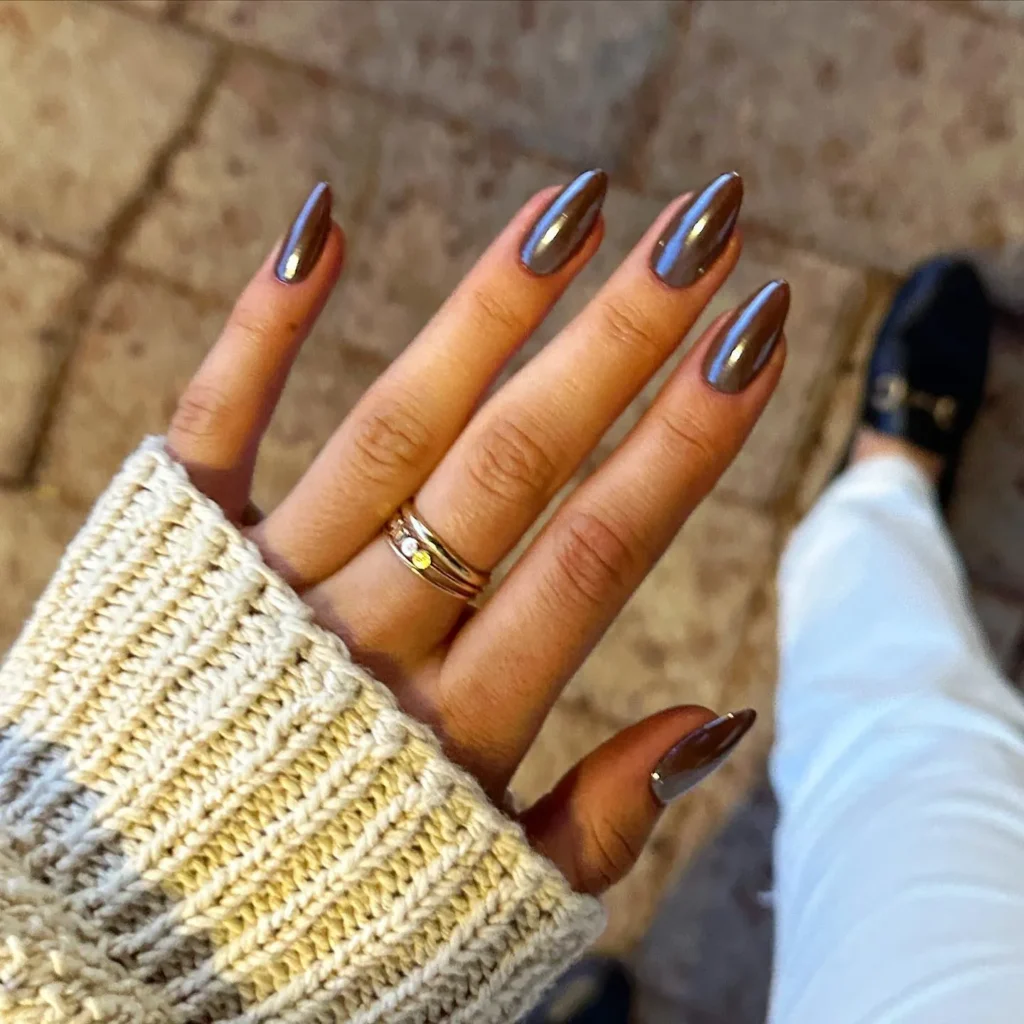 copper chrome almond nails with a liquid metal mirror finish
