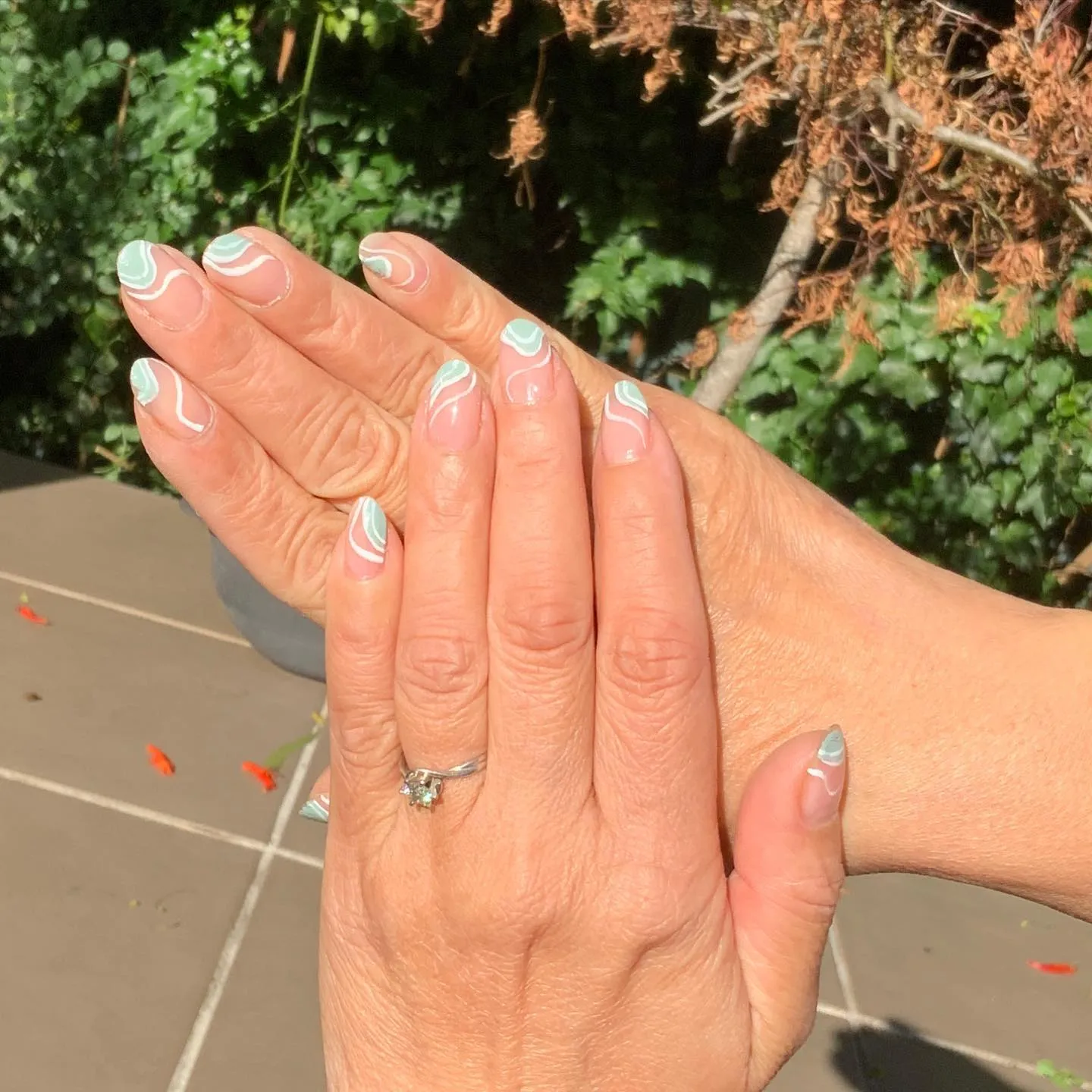 Green and White Almond Nails