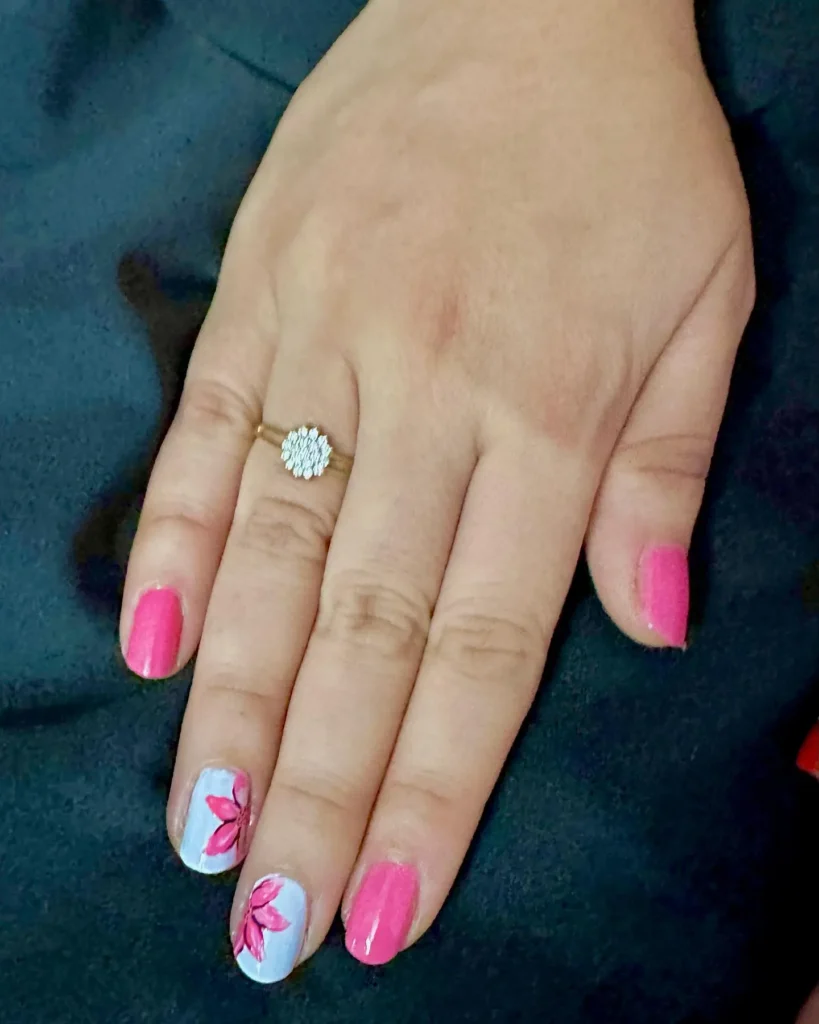 Pink and White Floral Art on Almond Nail Designs