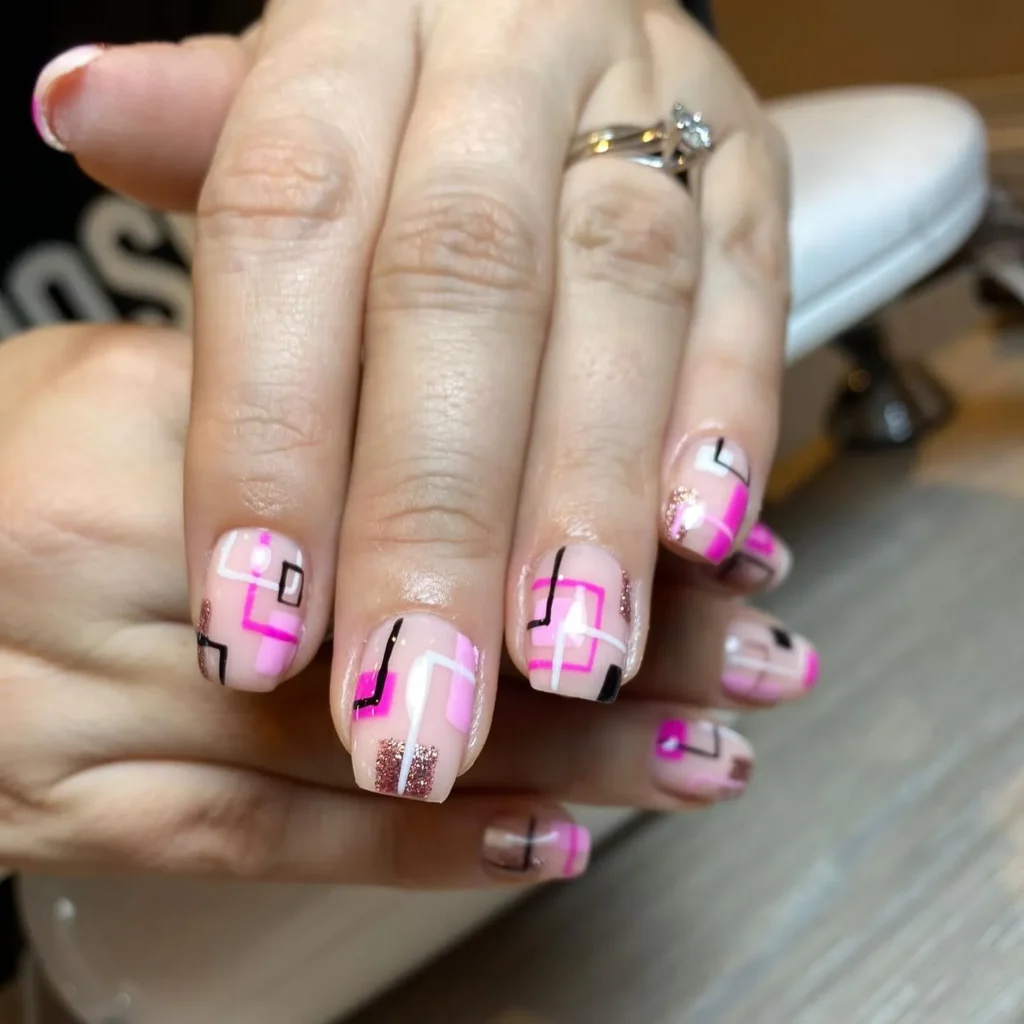 Pink Almond Nails with Geometric Shapes
