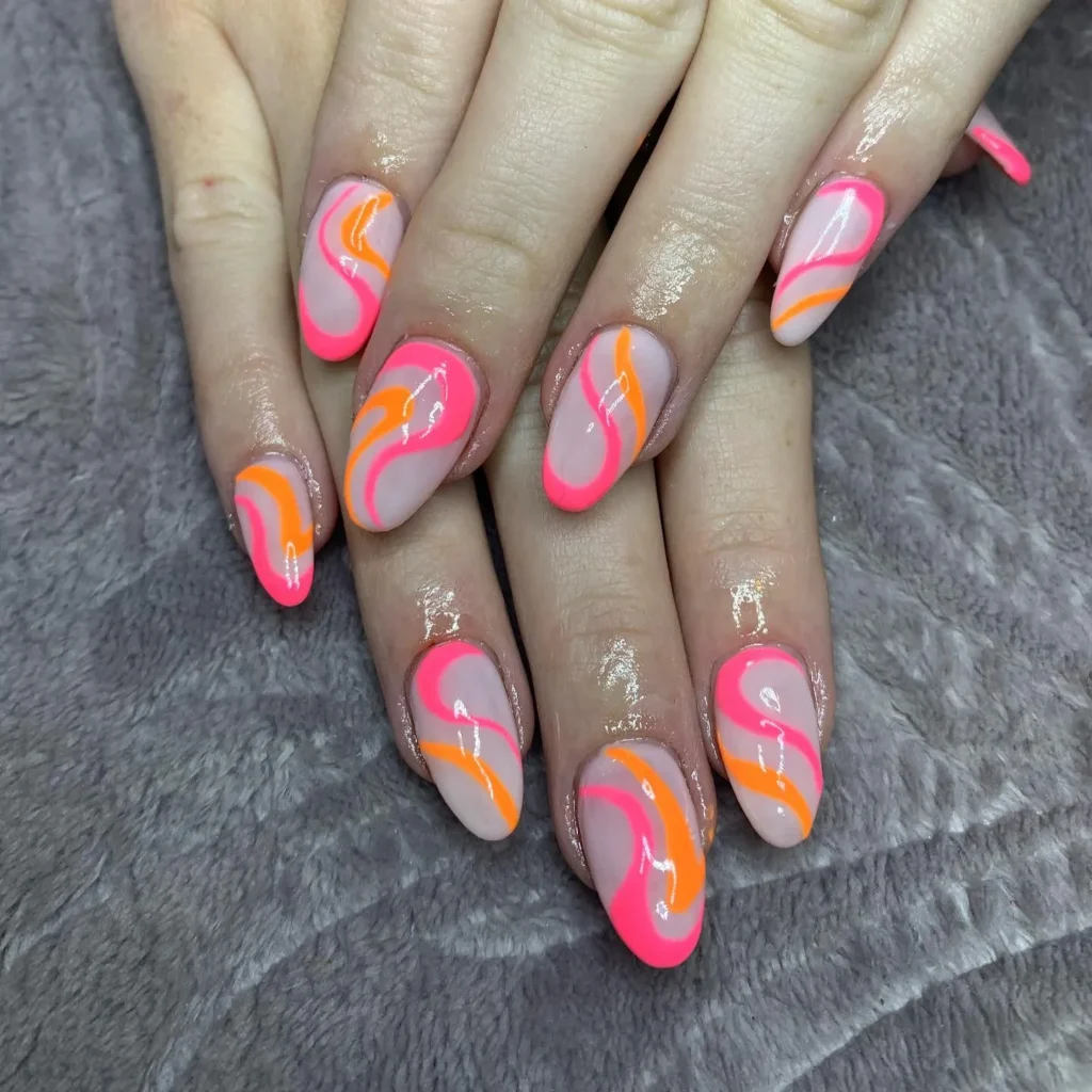orange and pink gradient almond nails