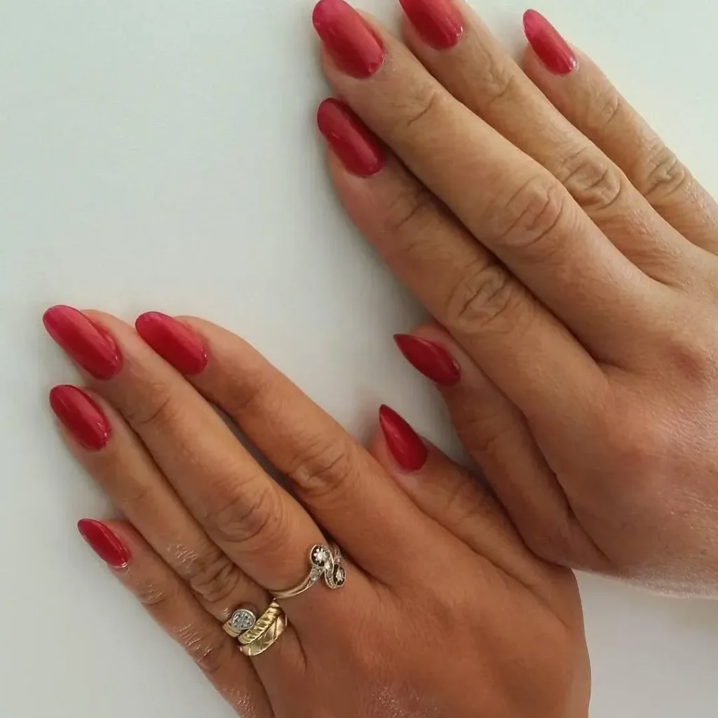 Red and Glitter Accent Almond Nails