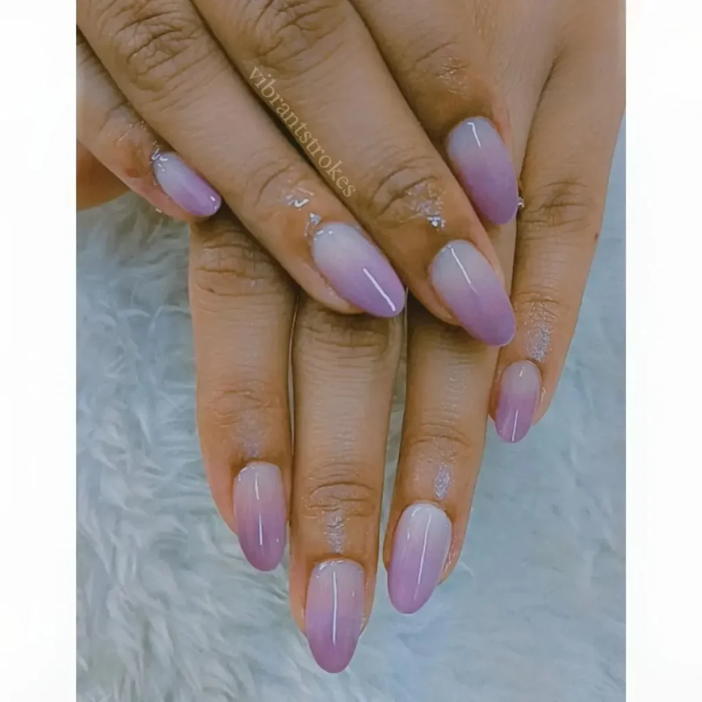 purple ombre almond nails fading from pale lilac to deeper purple