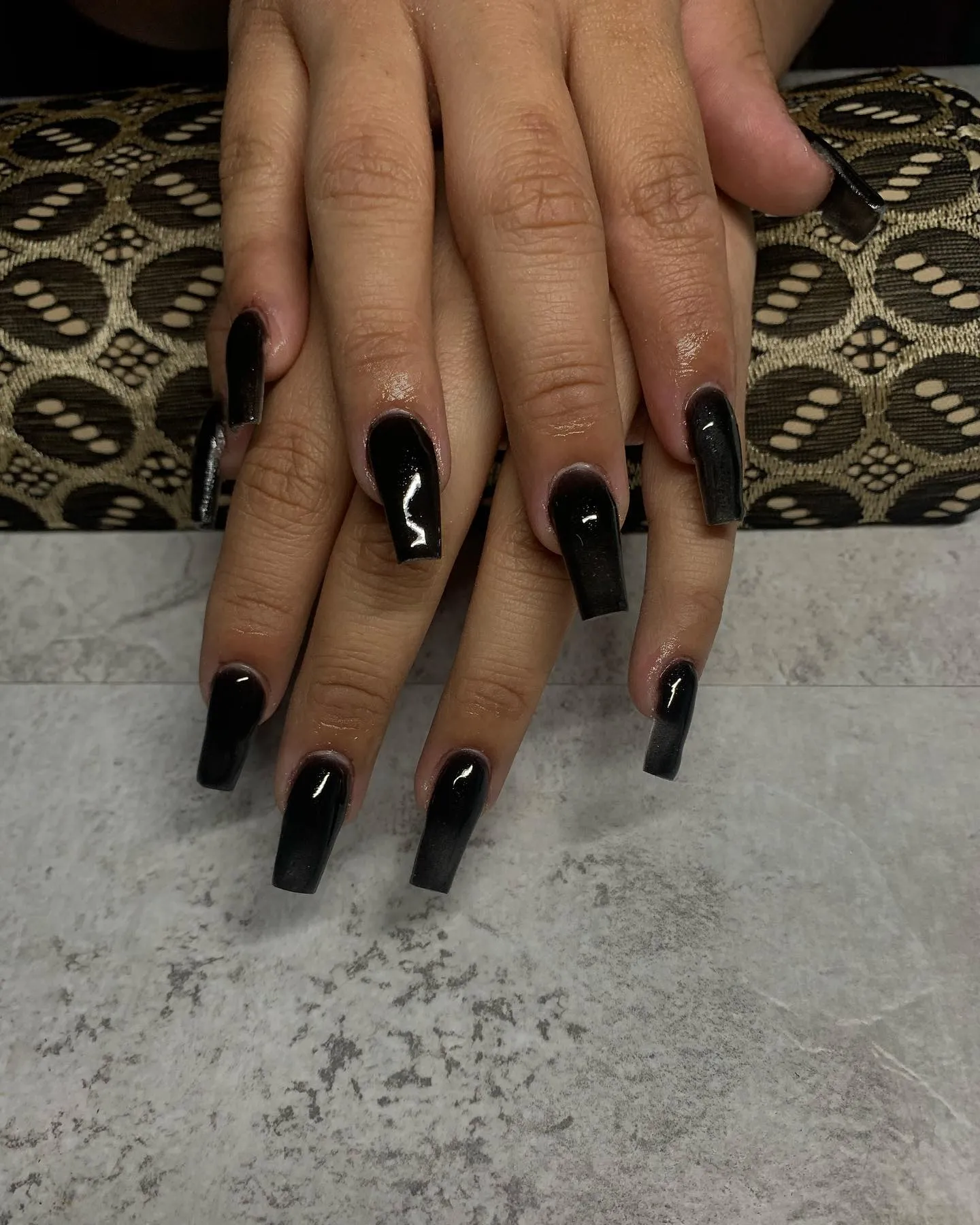 Glossy Black Coffin Nails for a Shine