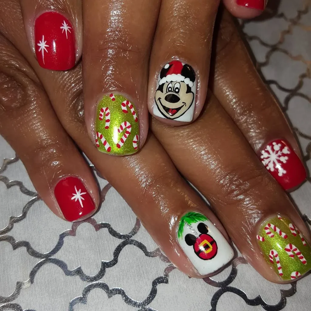 christmas almond nails with a Mickey silhouette accent