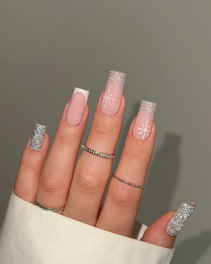 silver ombre christmas almond nails with hand-painted snowflakes