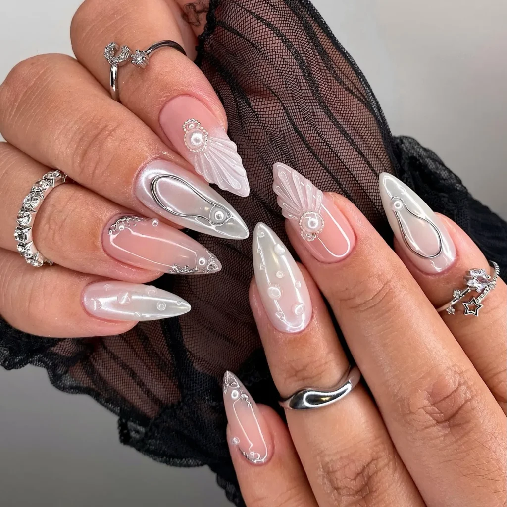 pearl-studded neutral christmas almond nails