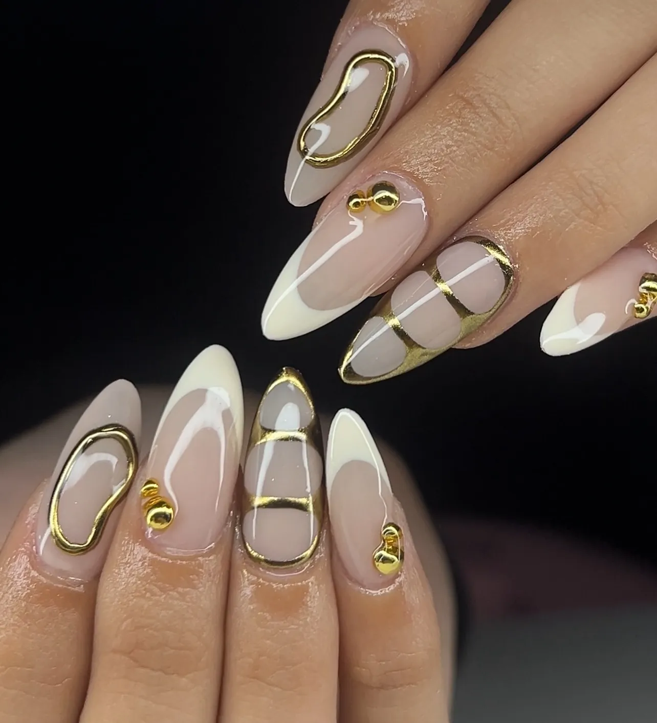 Nude Almond with Gold Charms and White French Tips Nails