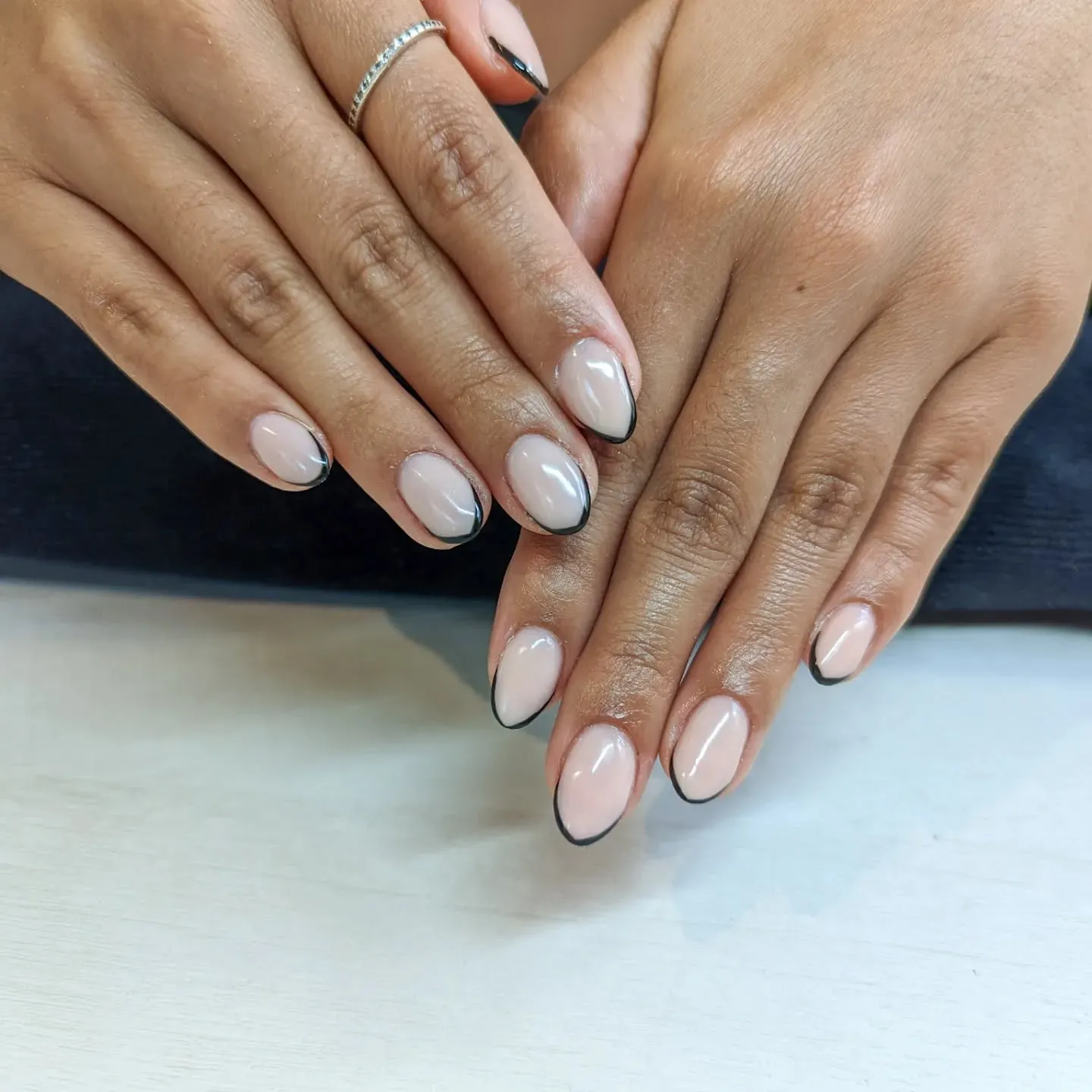 French Tip Nails In Matte Black For A Sleek Look