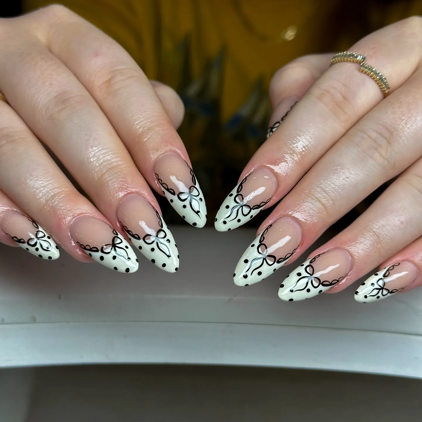 Lace-patterned white French tips