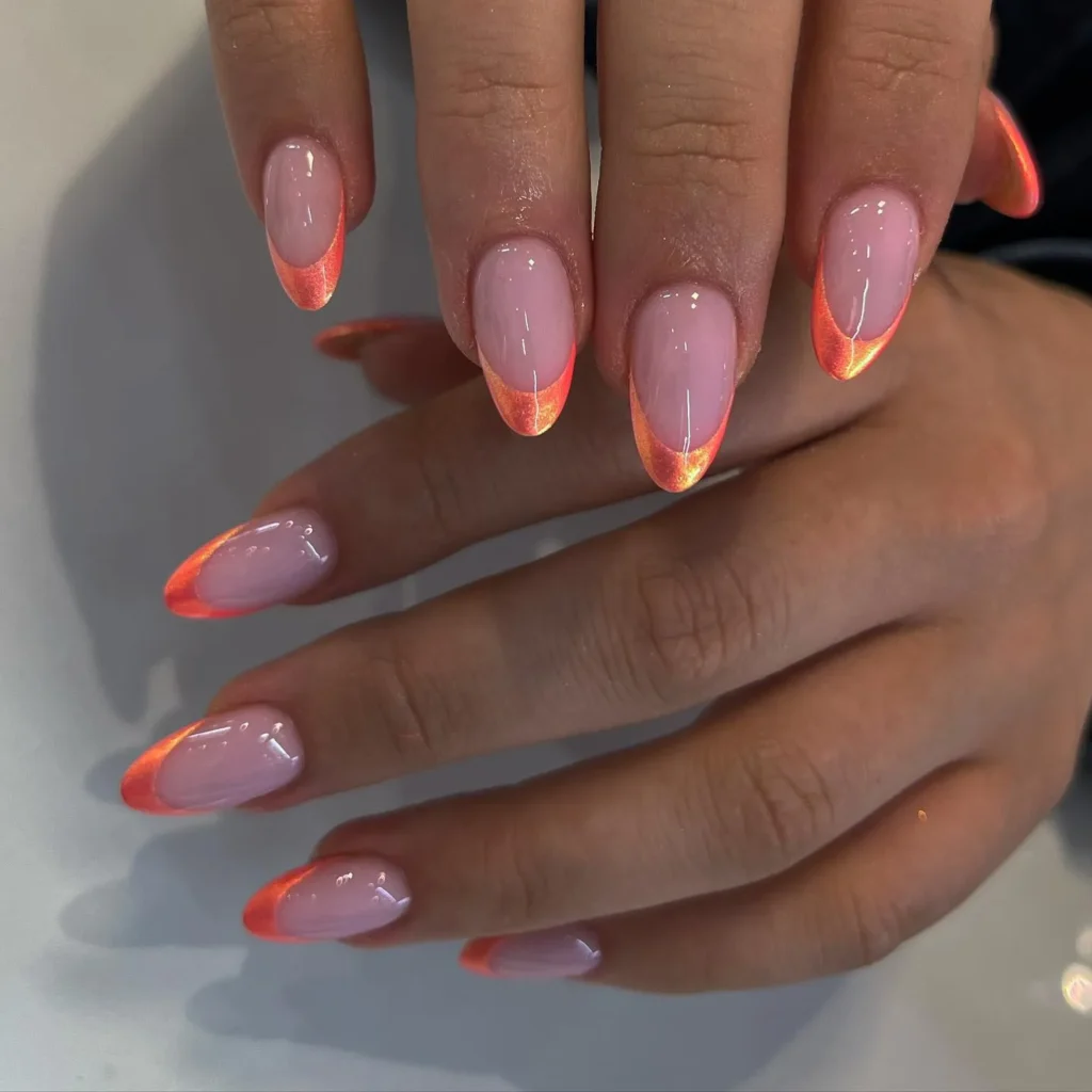 muted autumnal orange tone on almond nails