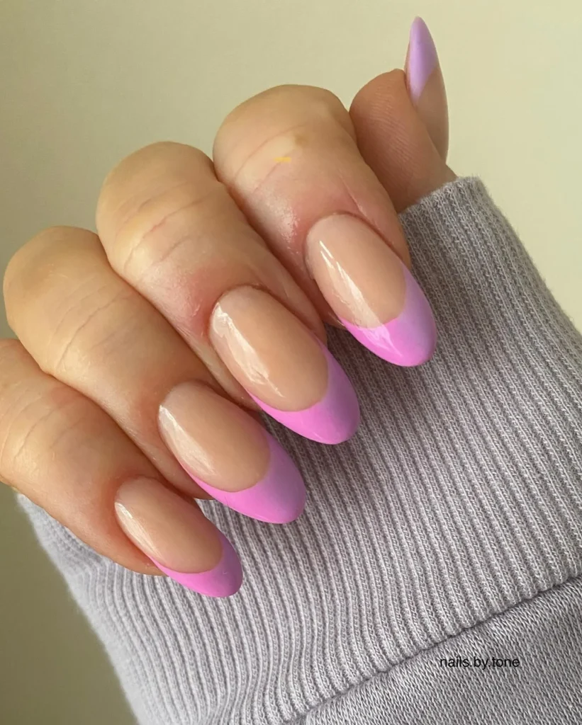 purple French tip long almond nails over a sheer nude base