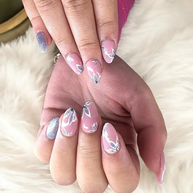 Glitter French Tips with Floral Accents Glitter French Tips with Floral Accents