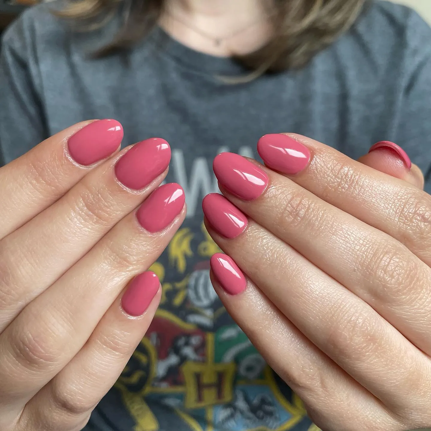 Dusty rose pink nails with a soft glossy finish