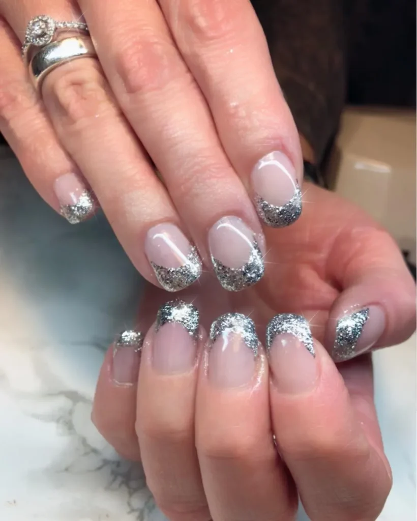 classic silver glitter French tip almond nails