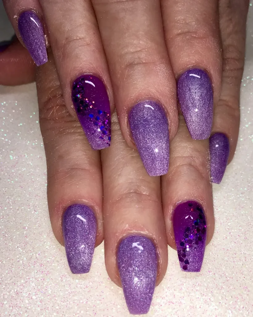 light purple and lilac almond nails with a soft pastel finish