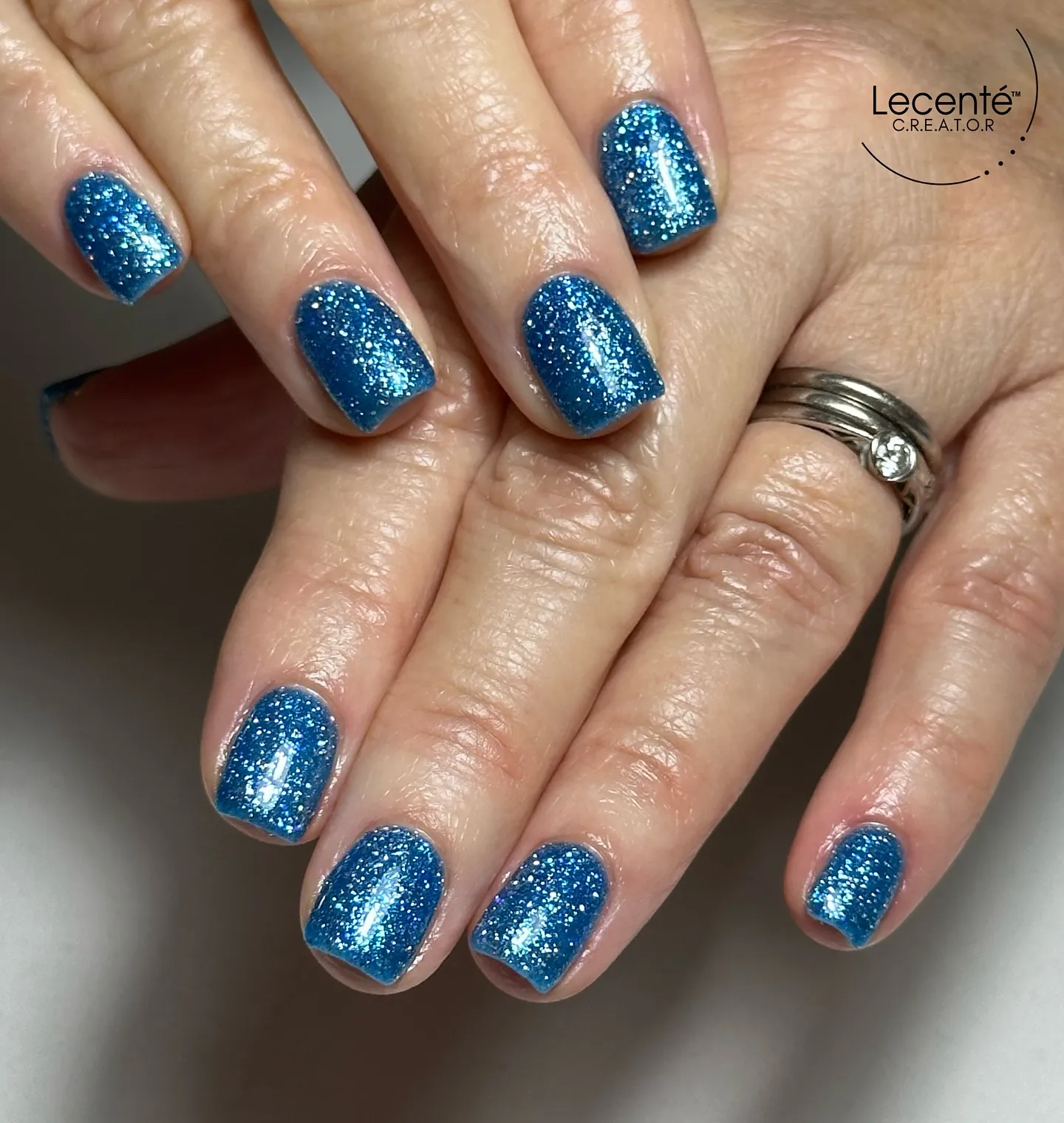 Sapphire Blue Glitter Nails