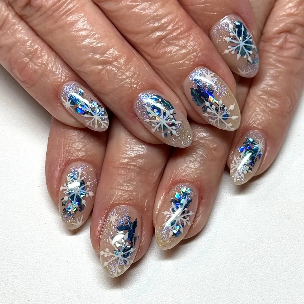 glitter christmas almond nails with white snowflakes