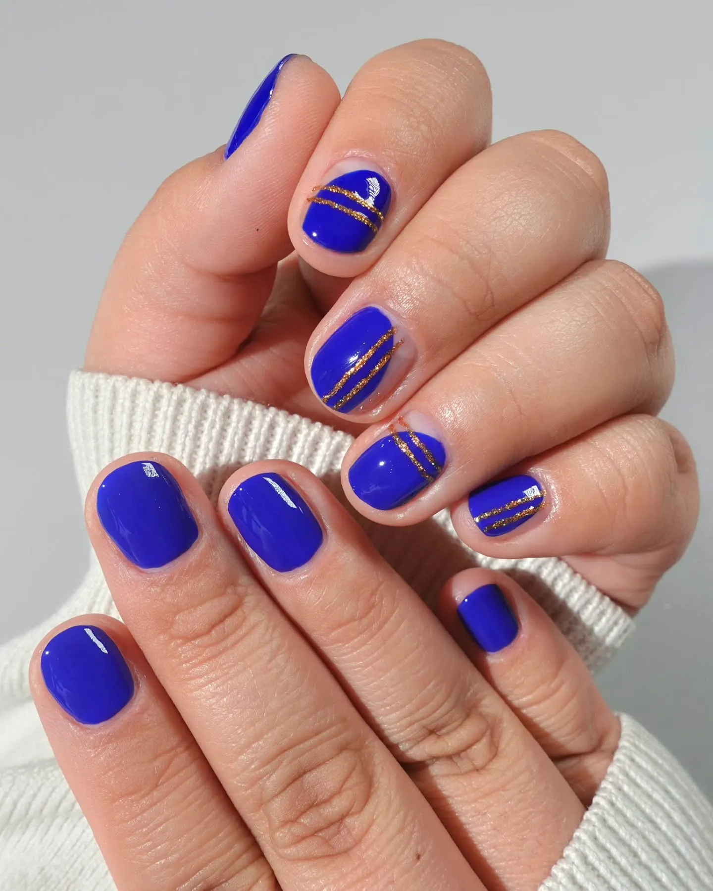 Negative Space Blue Glitter Nails