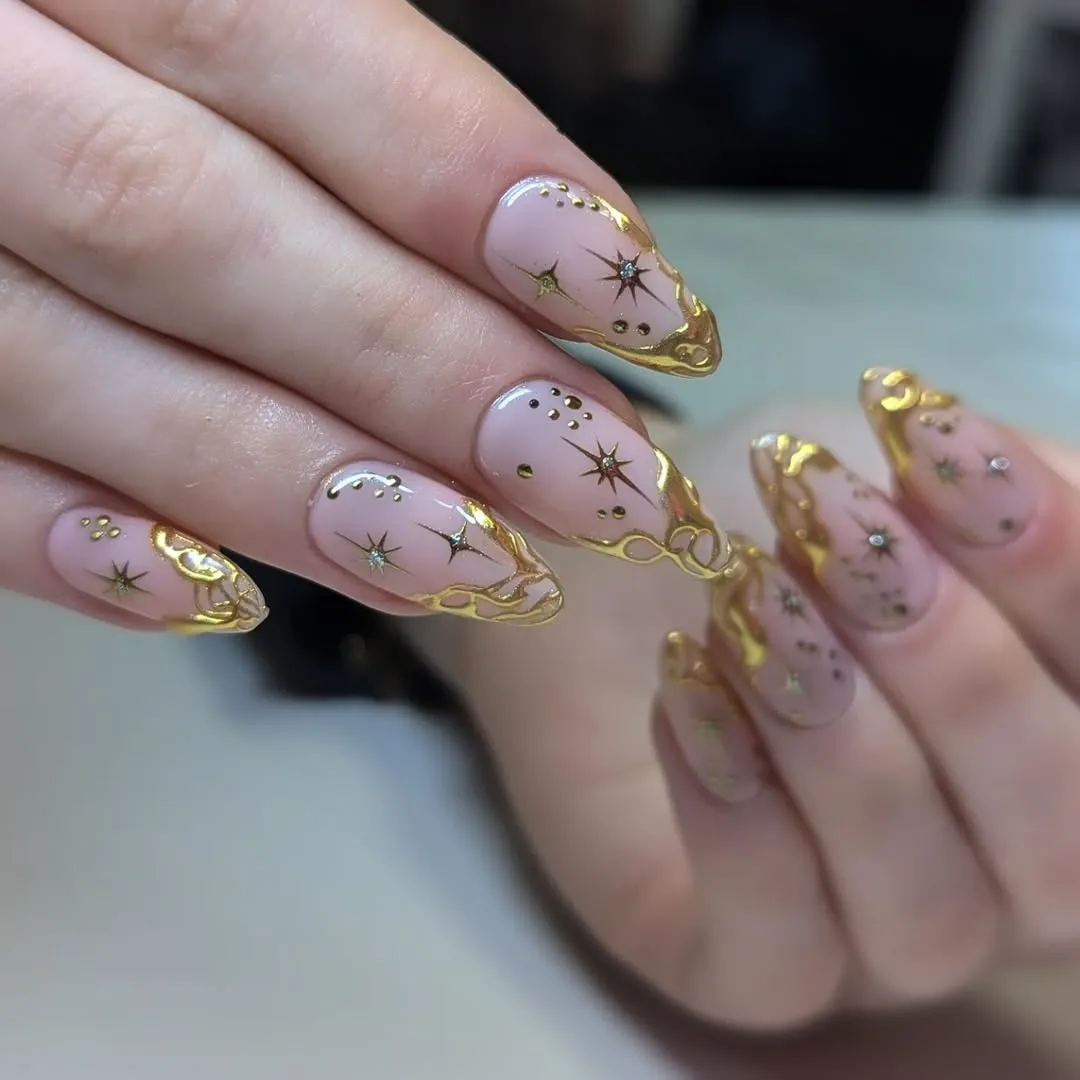 Rose Gold Nails With Celestial Effect