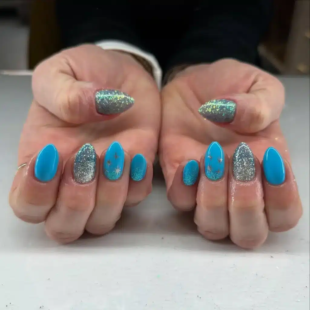 turquoise blue long almond nails with silver glitter accent