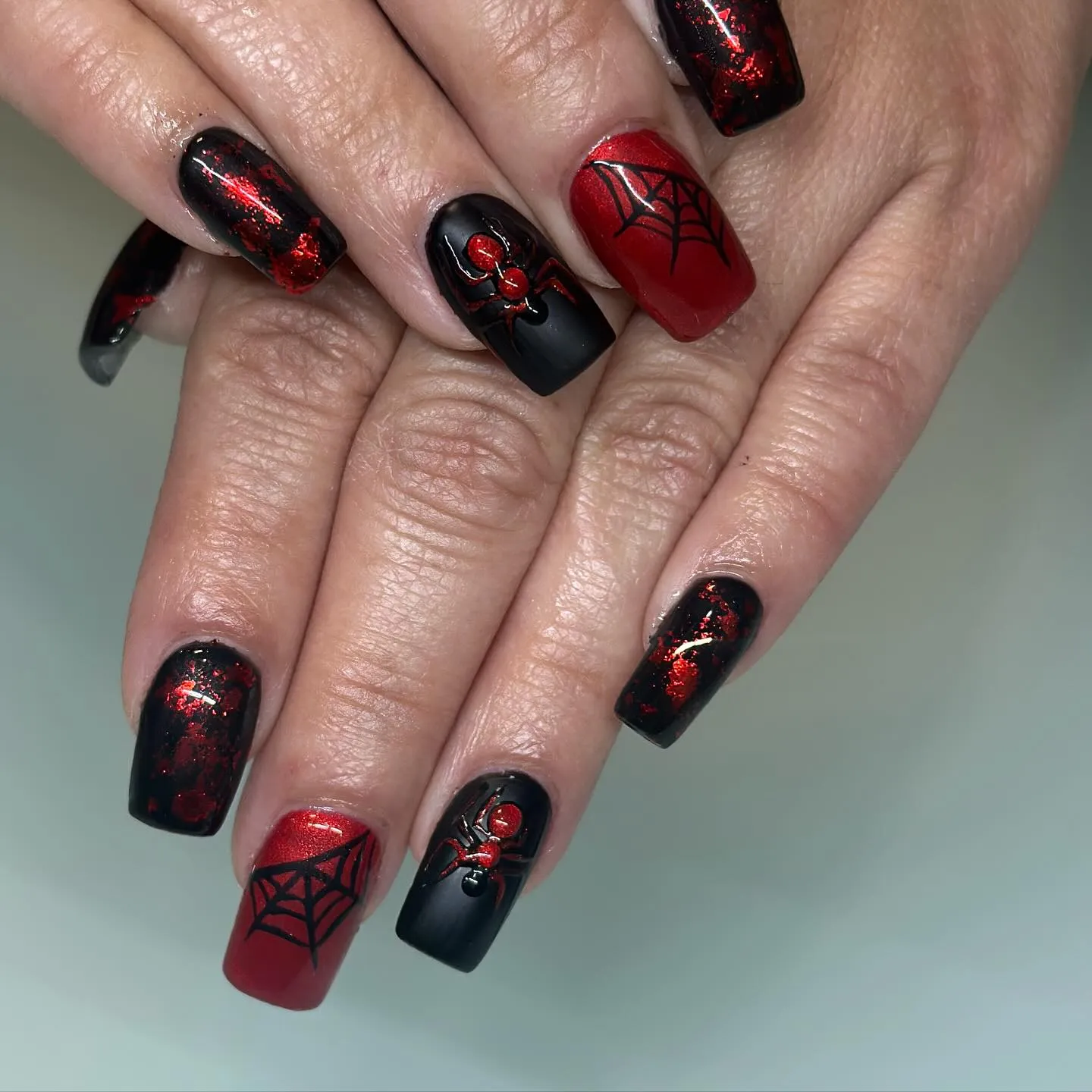 Matte Black Nails with Red Accents