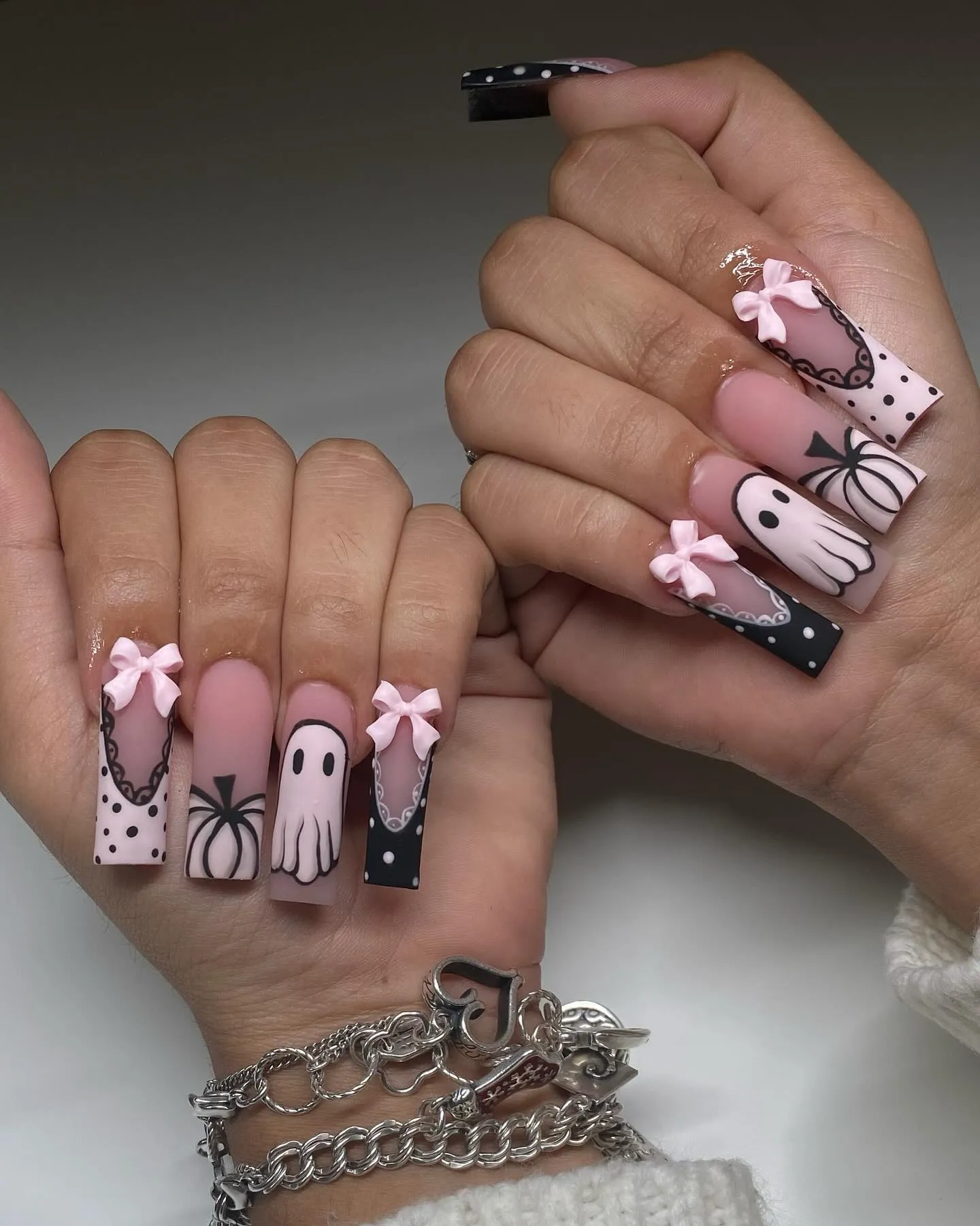 Pink Ghost Face Nail Art