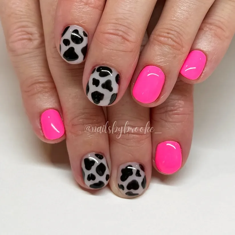 Neon Pink Nails with Black Accents