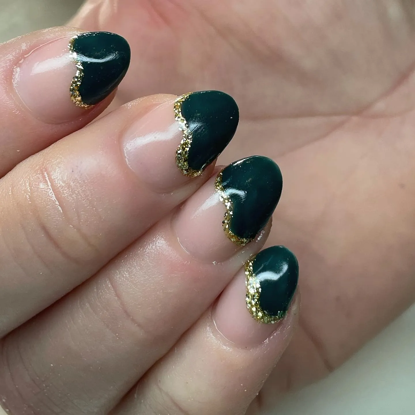Emerald green nails with gold Accents