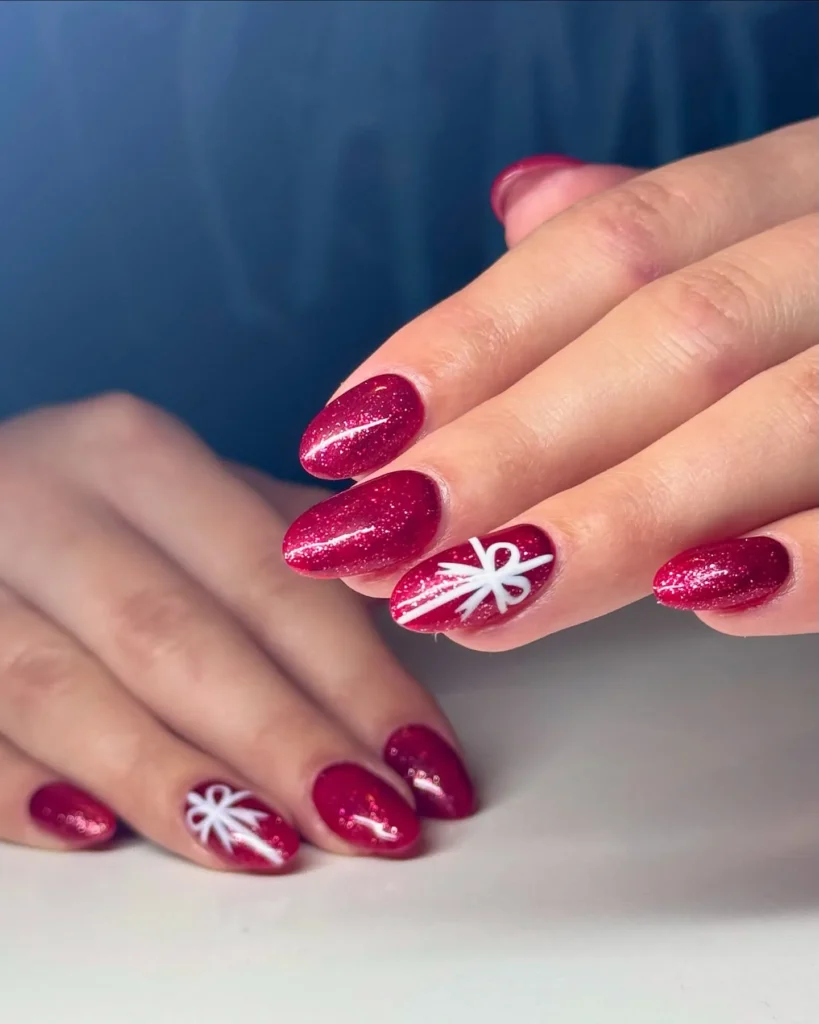 full coverage red glitter christmas almond nails