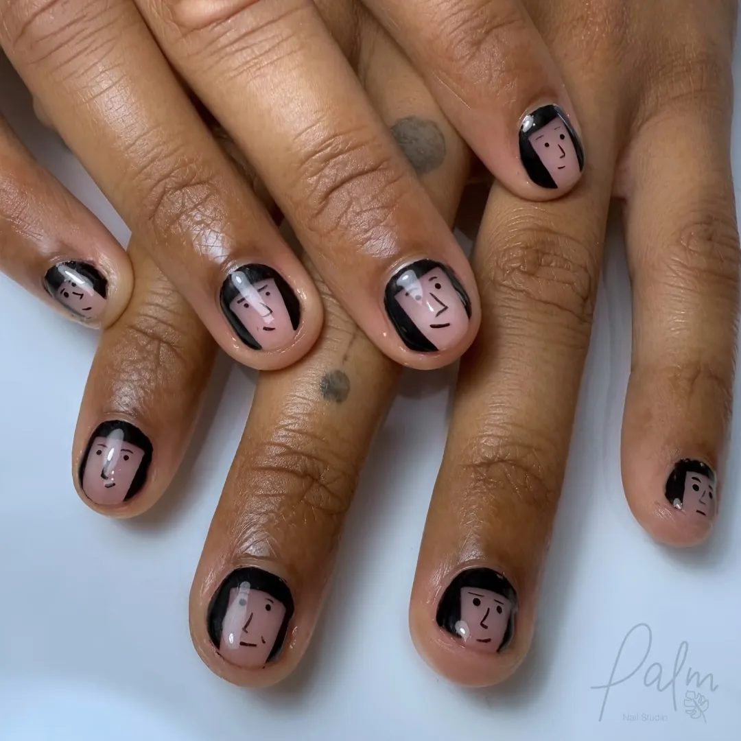 Cute Black Cartoon-Inspired Halloween Nails