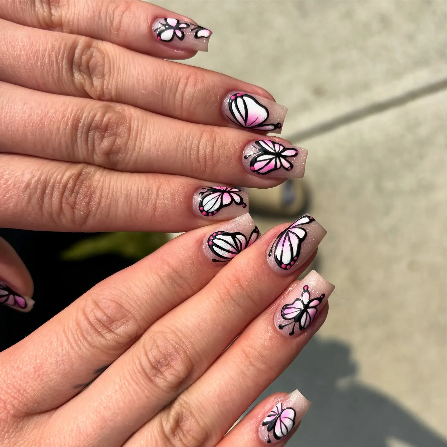 Pink Nails with Black Butterfly Art