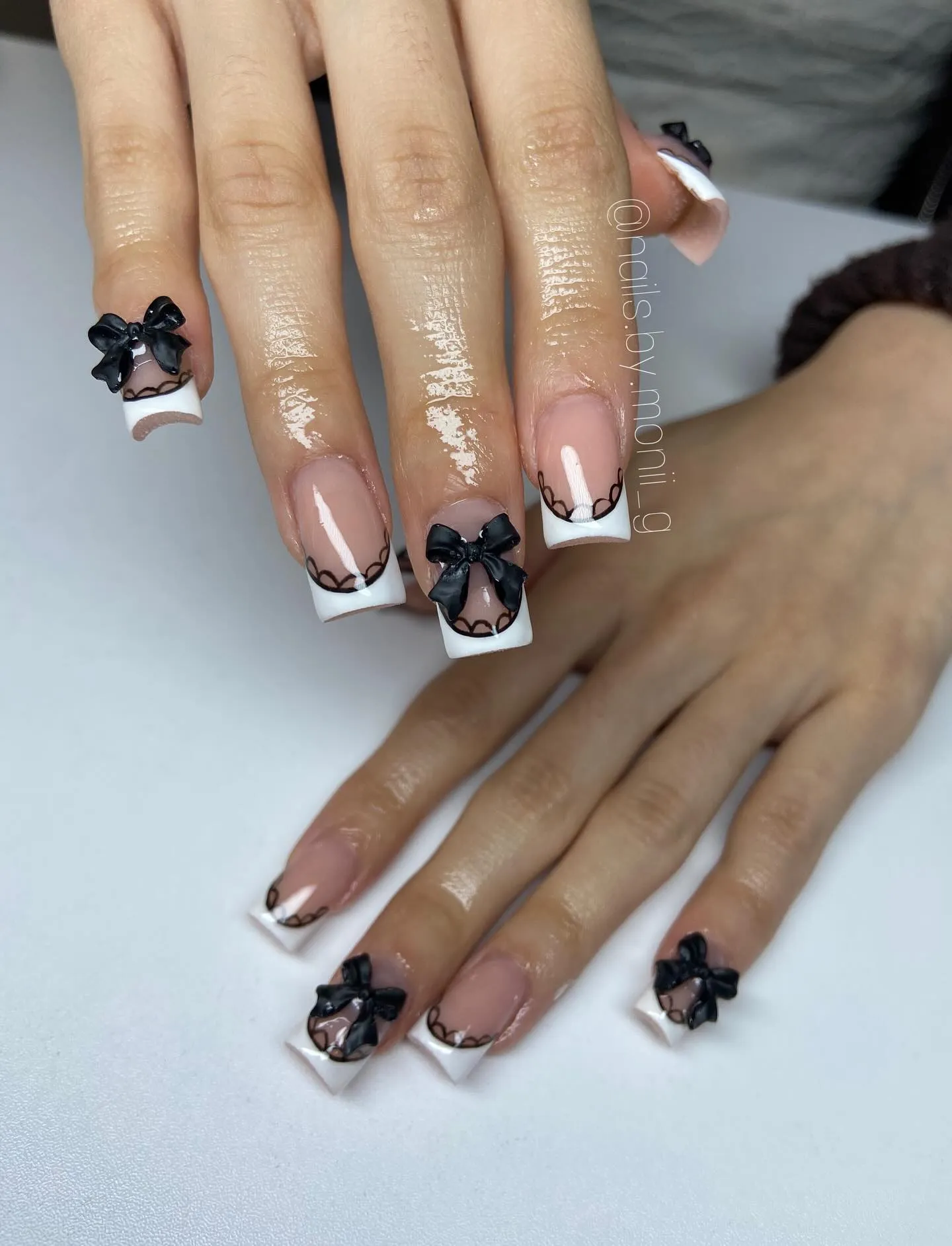 Pink Nails with Black Lace Patterns