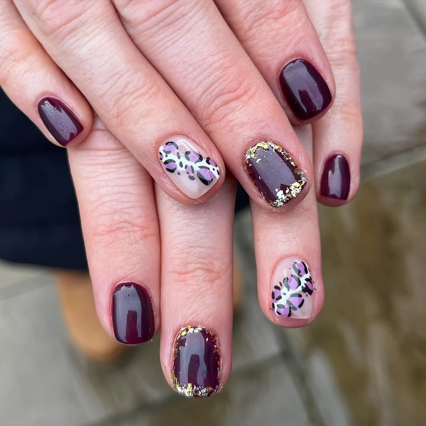 Plum nails with gold glitter