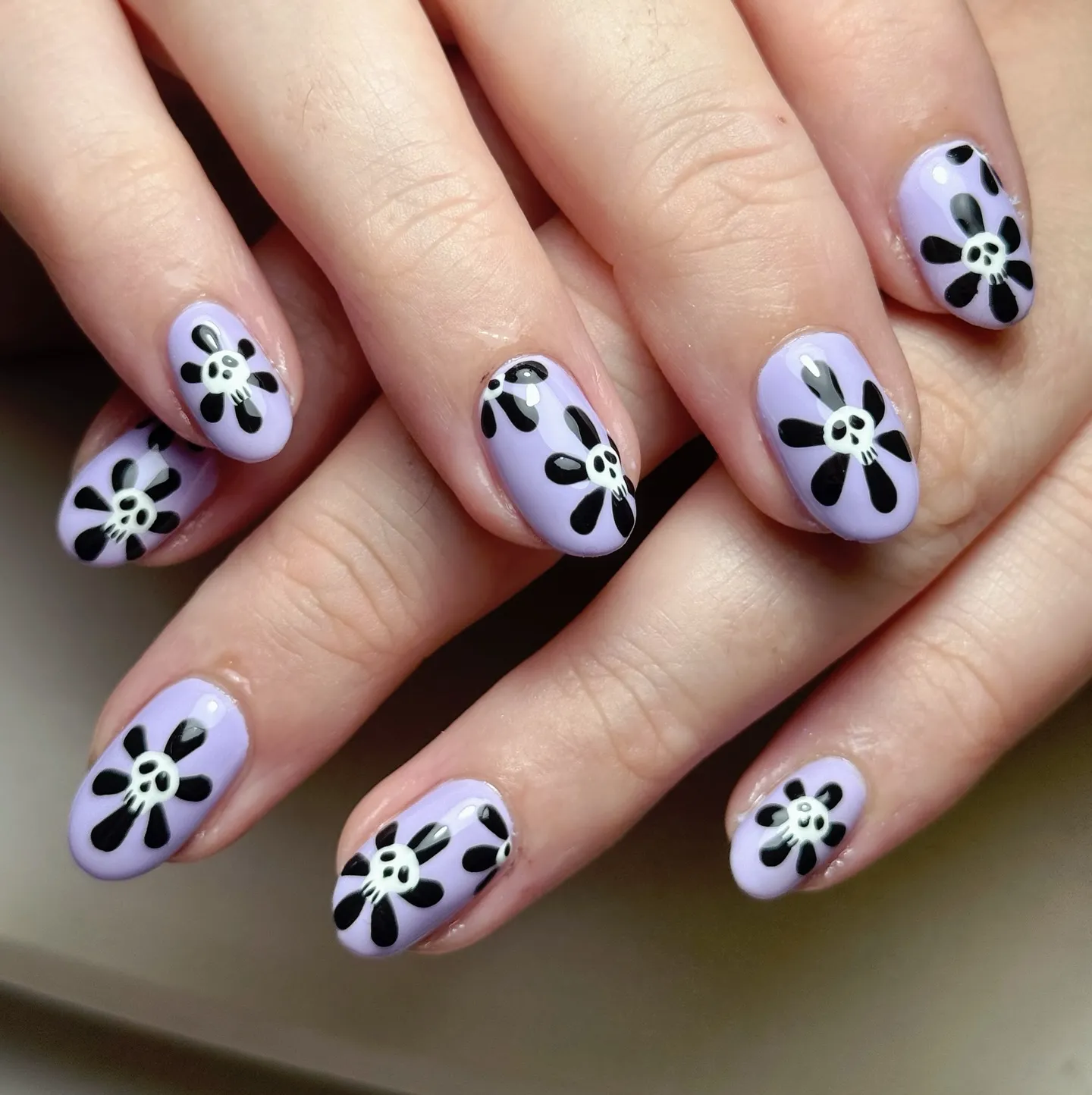 Purple Coffin Nails with Skulls
