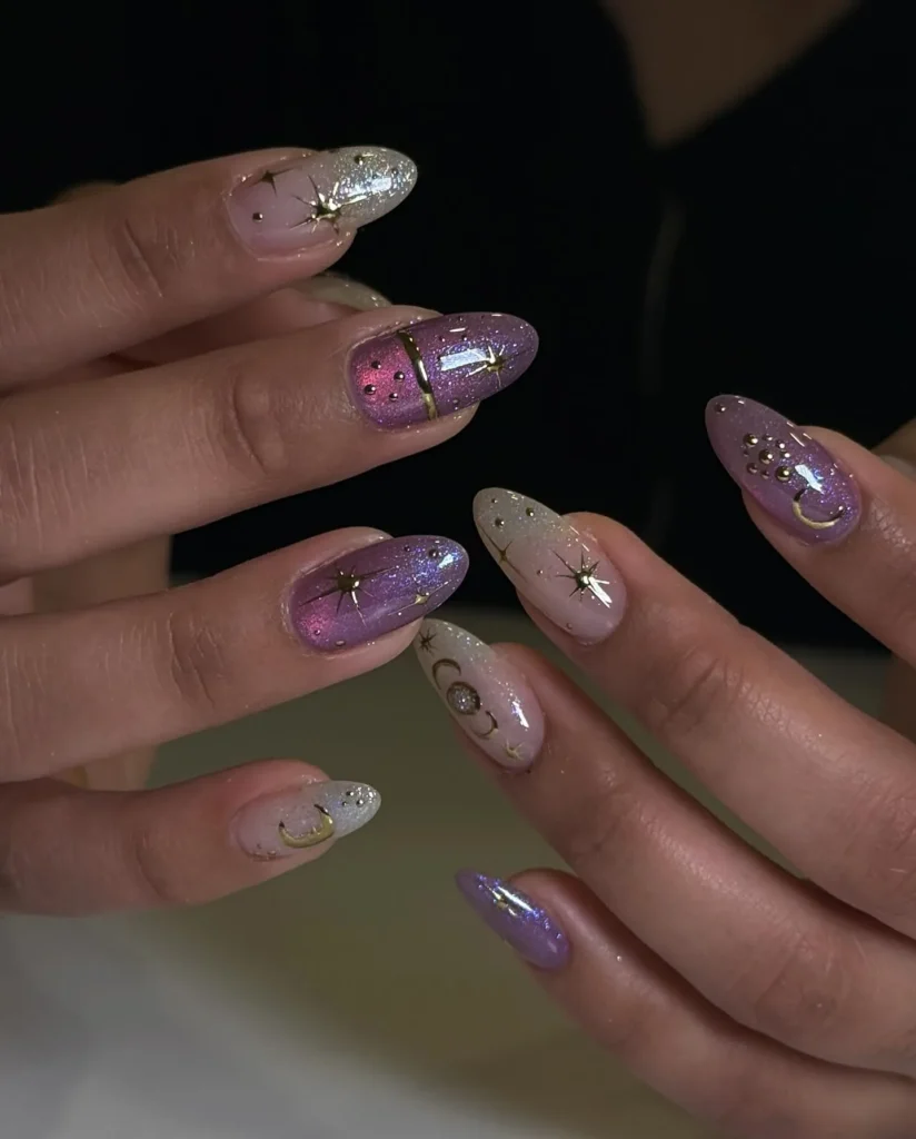 shimmery purple galaxy almond nails with a cosmic sheen