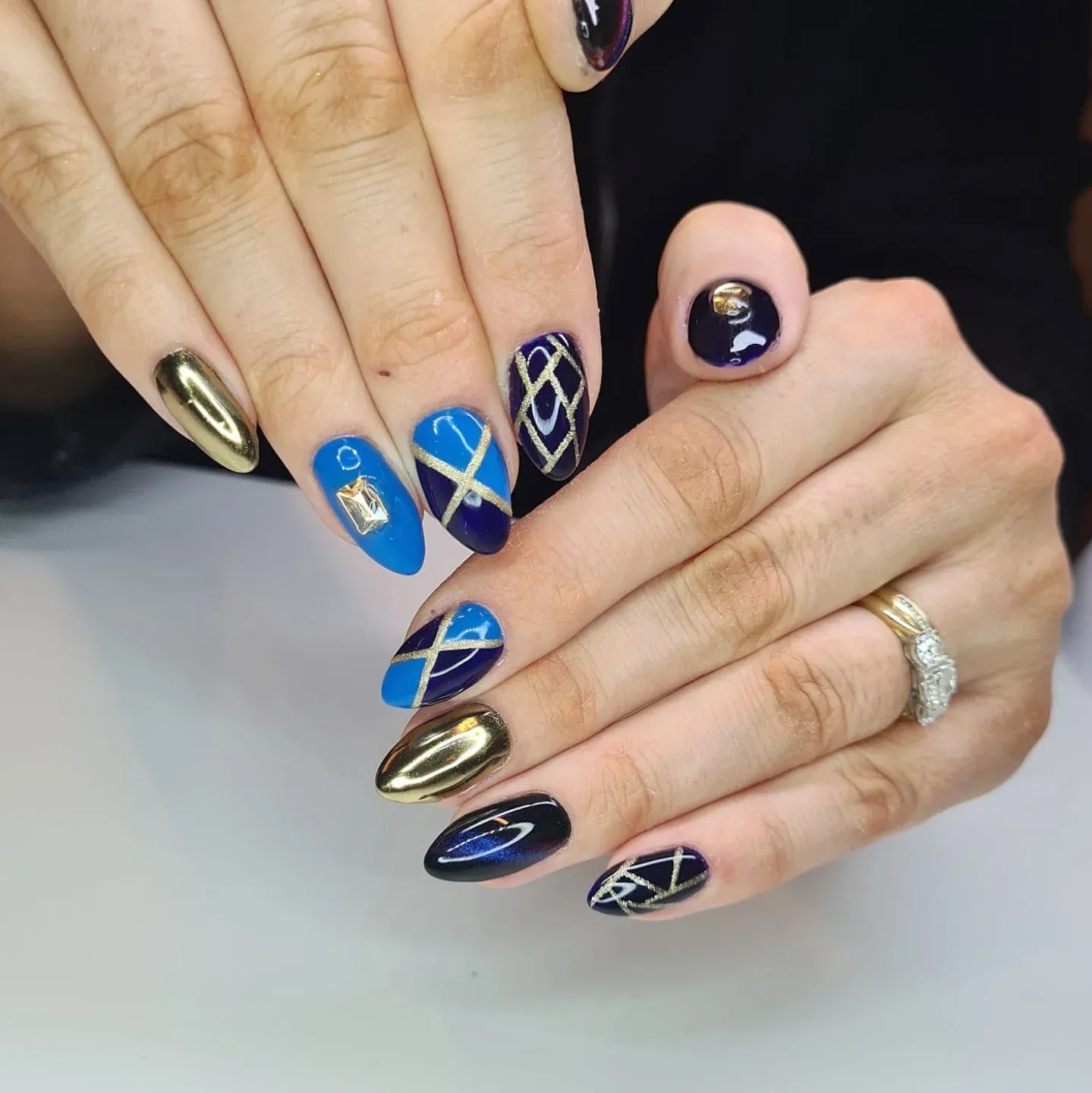 Blue and gold Glitter nails