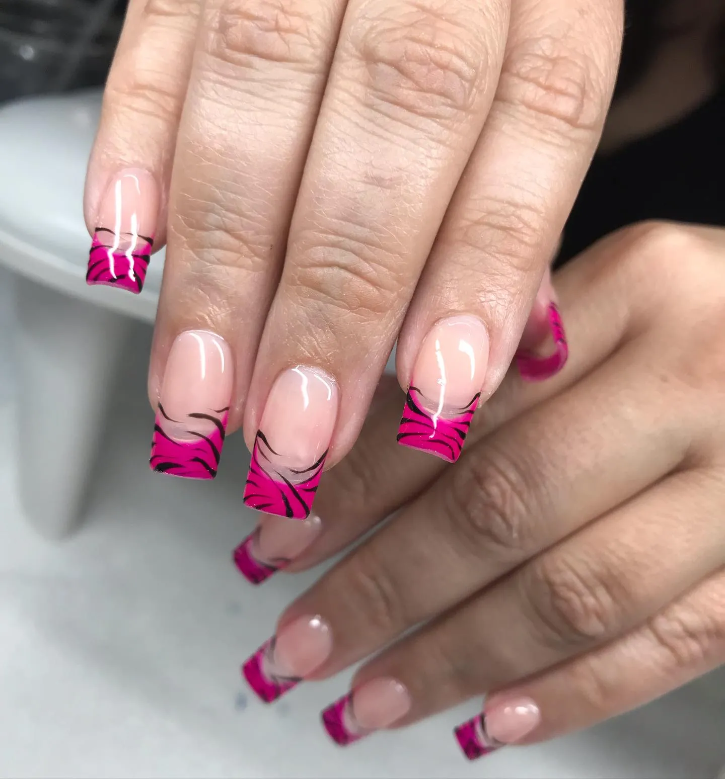 Pink and Black Swirl Nails