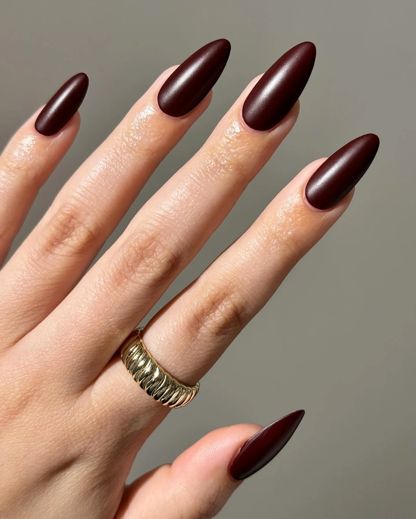 Deep burgundy matte almond nails