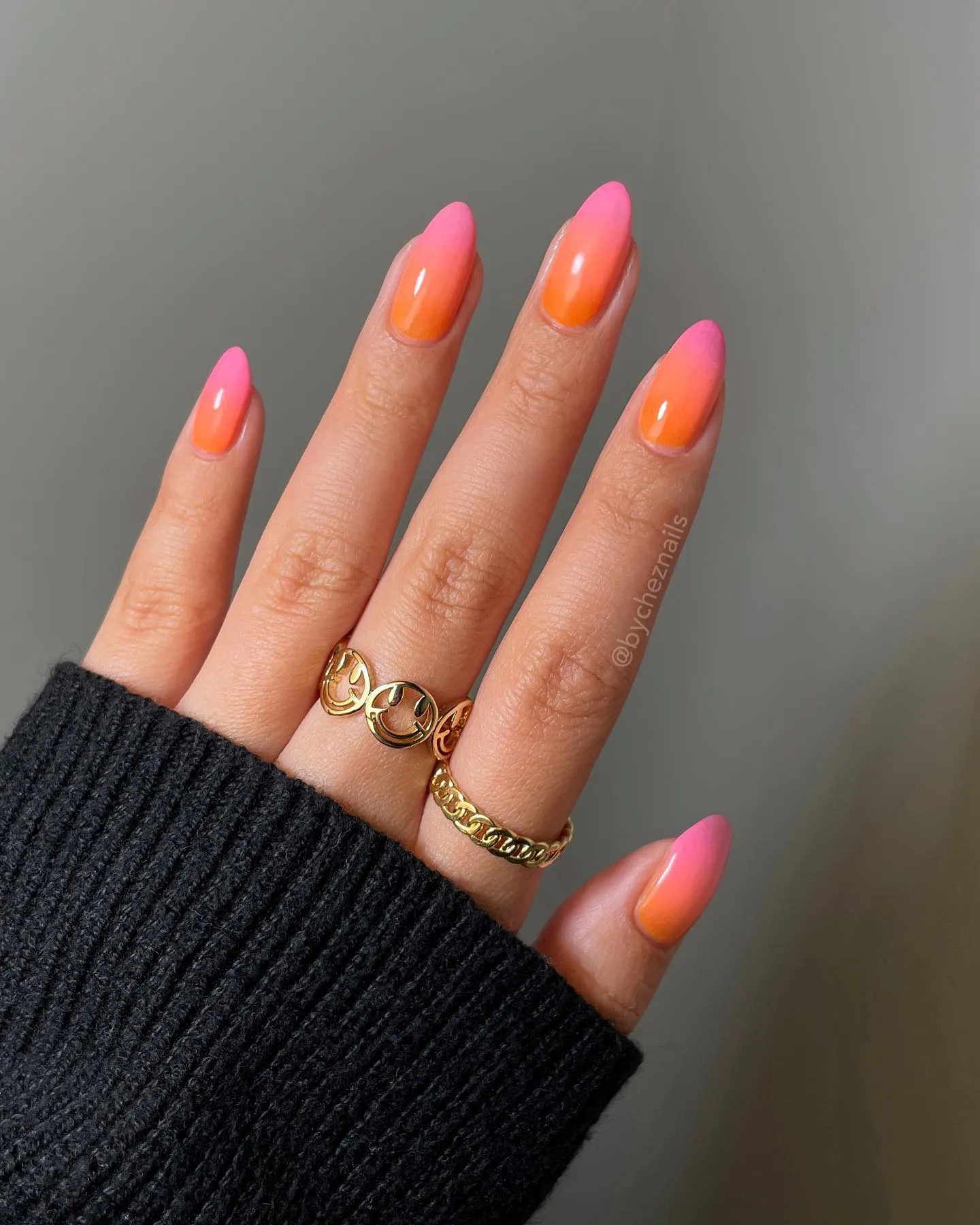 Pink to orange sunset ombre almond nails