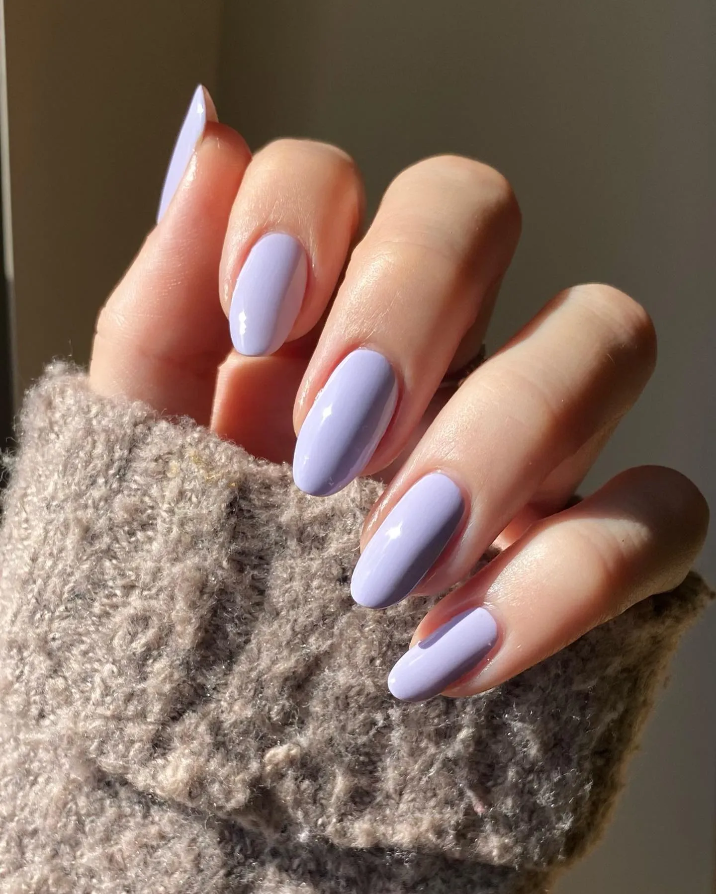 Glossy lavender oval nails