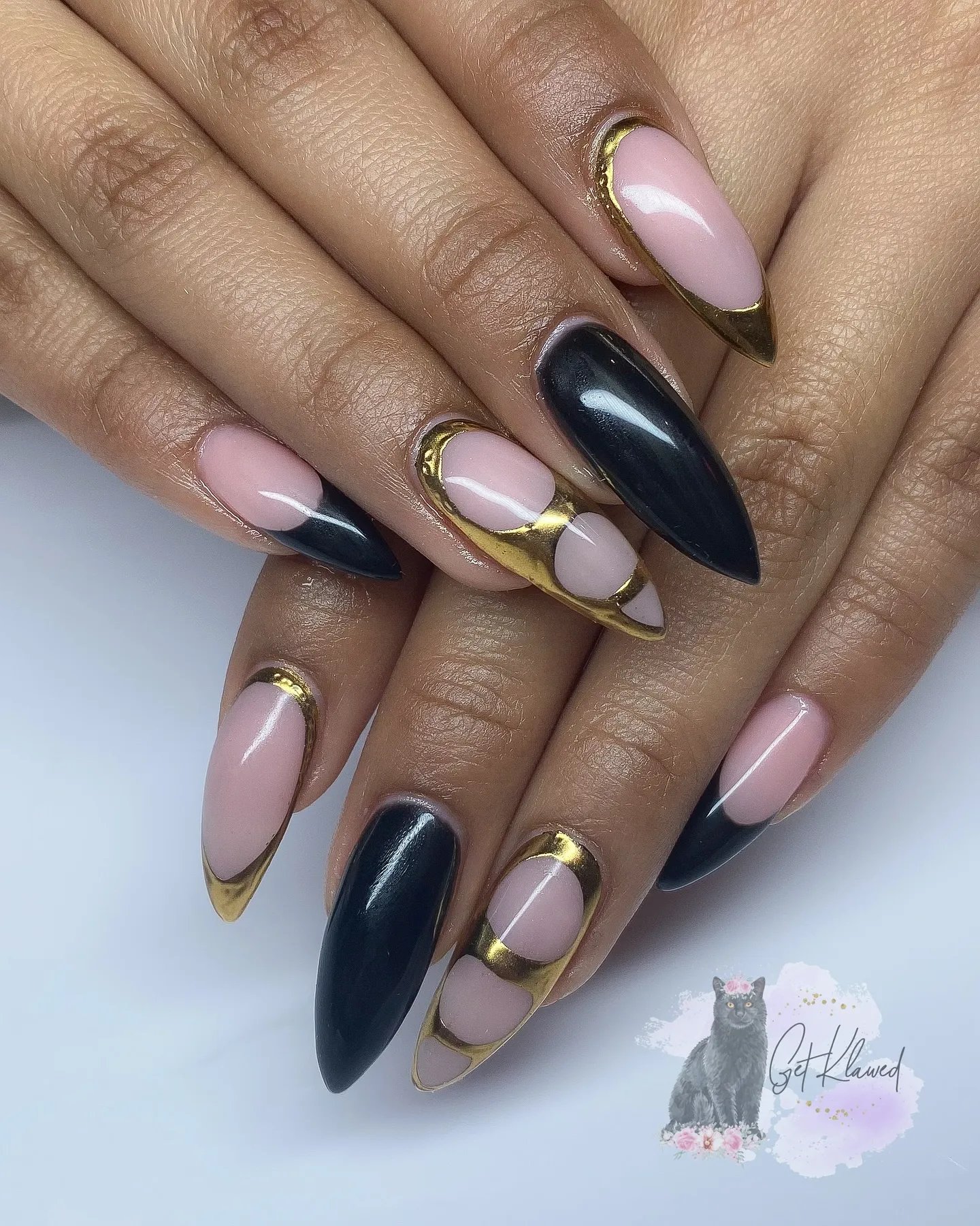 Black and Gold Foil Stiletto Nails