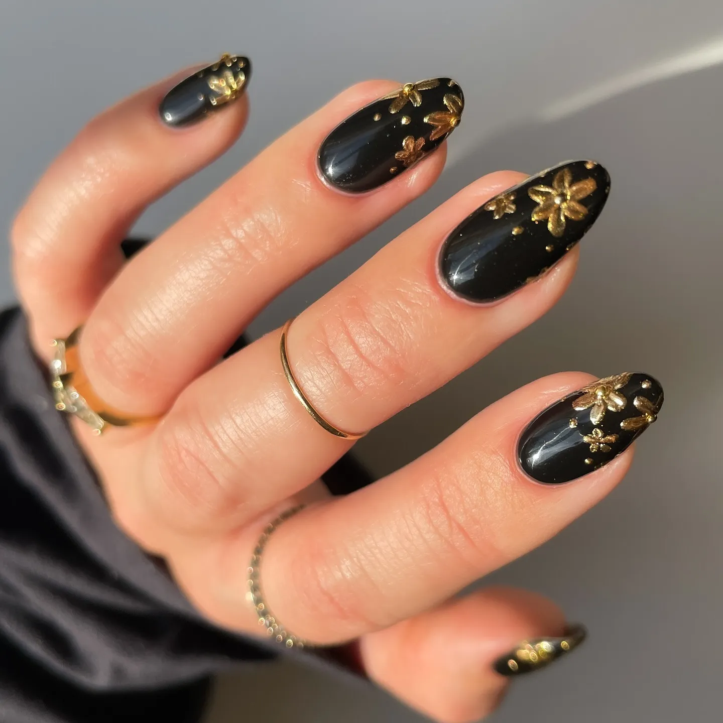 Black Almond Nails with Gold Touches