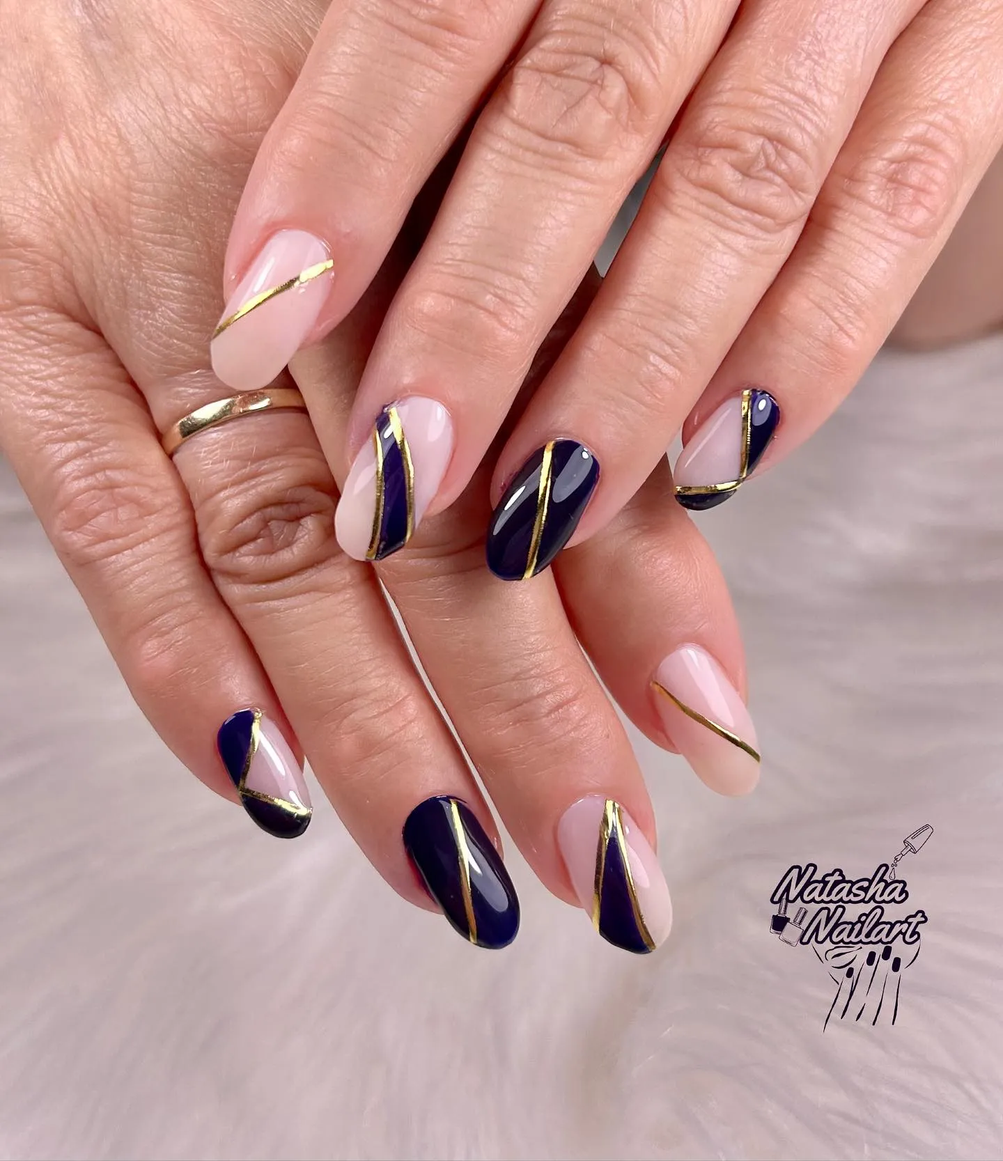 Gold Stripes on Matte Black Nails