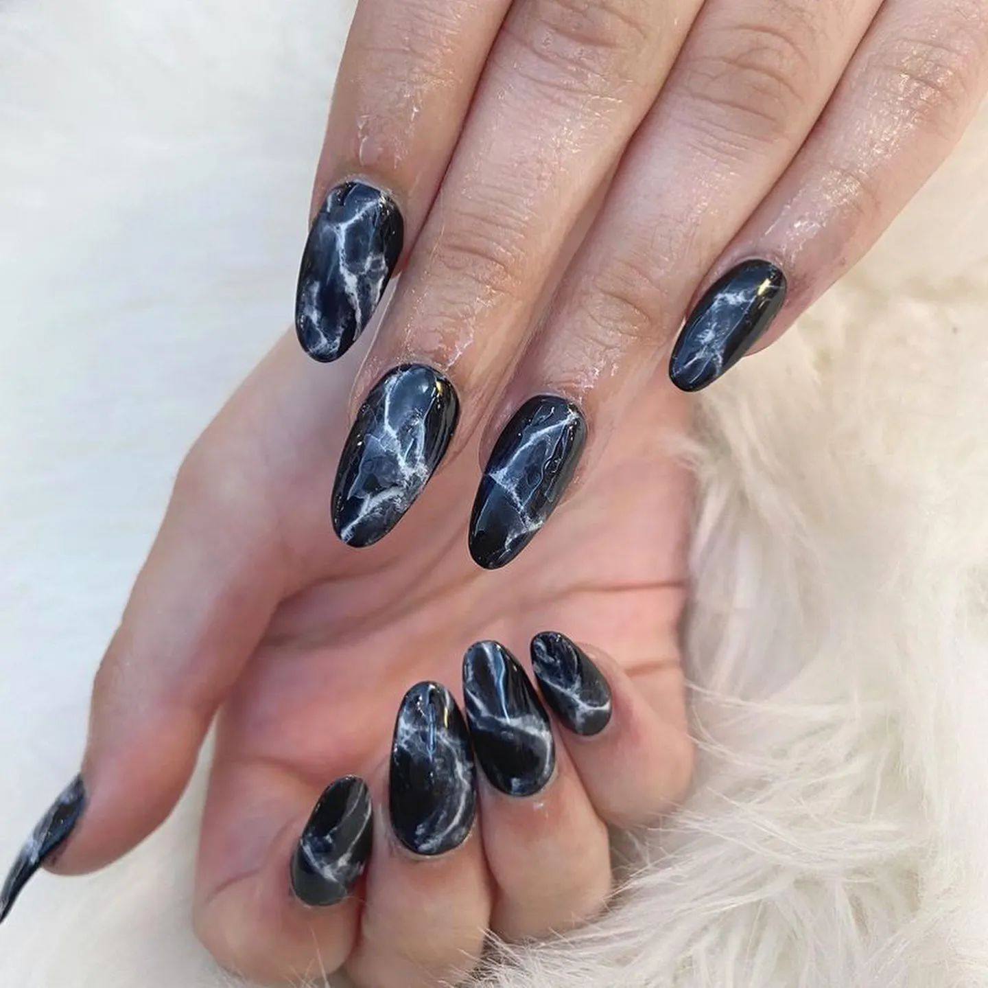 Almond black marble nails