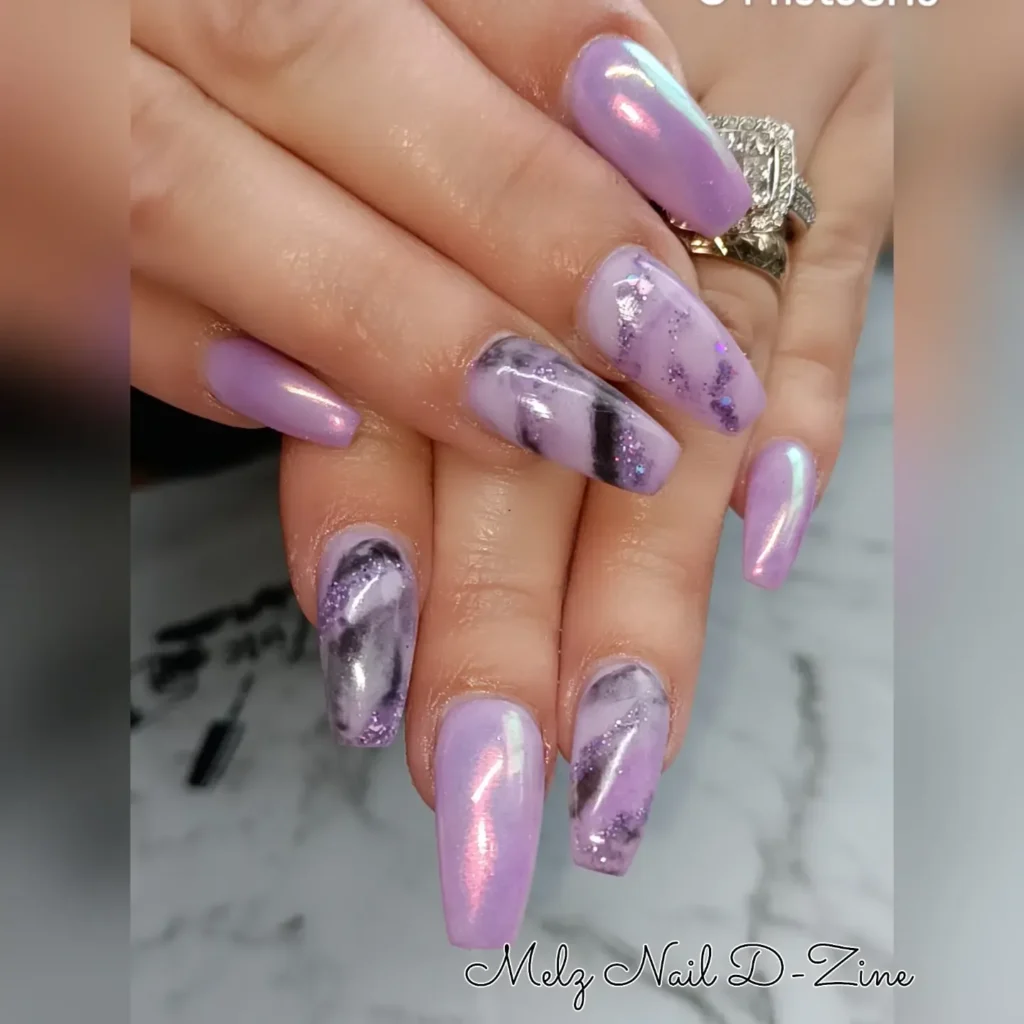 purple and black marble almond nails with smoky veining