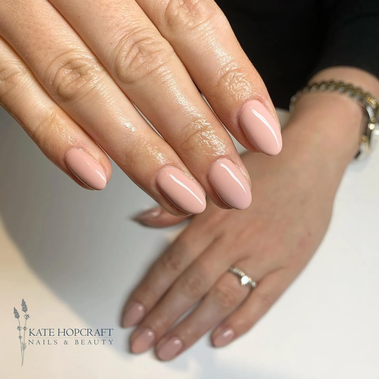 Nude Glitter Accent Almond Nails