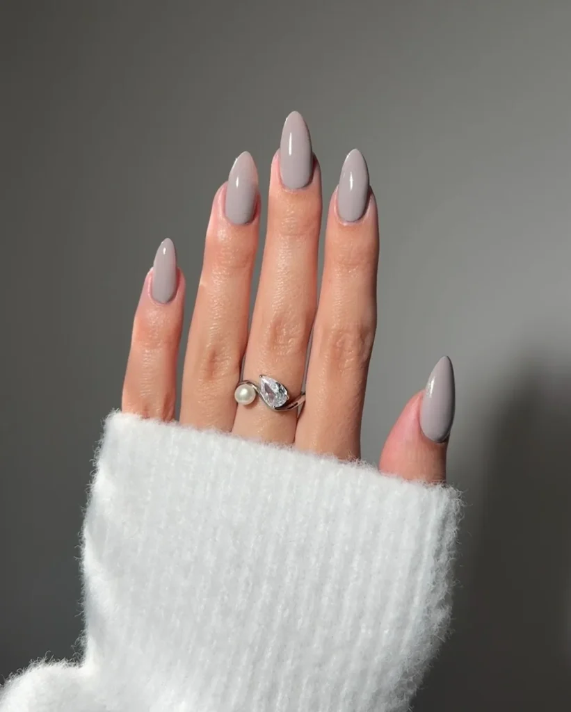taupe-gray glossy classic almond nails