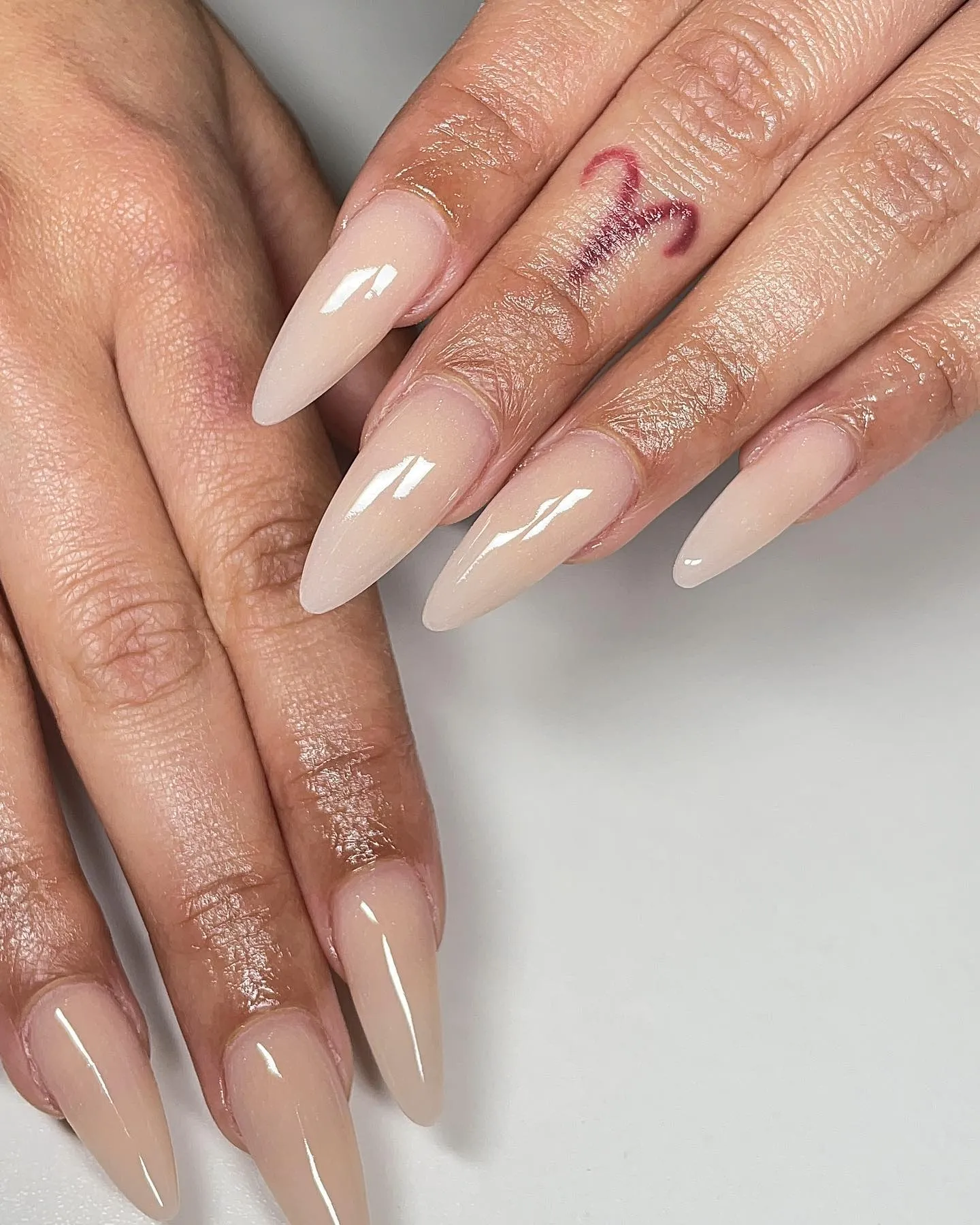 Nude Almond Nails with Airbrush Design
