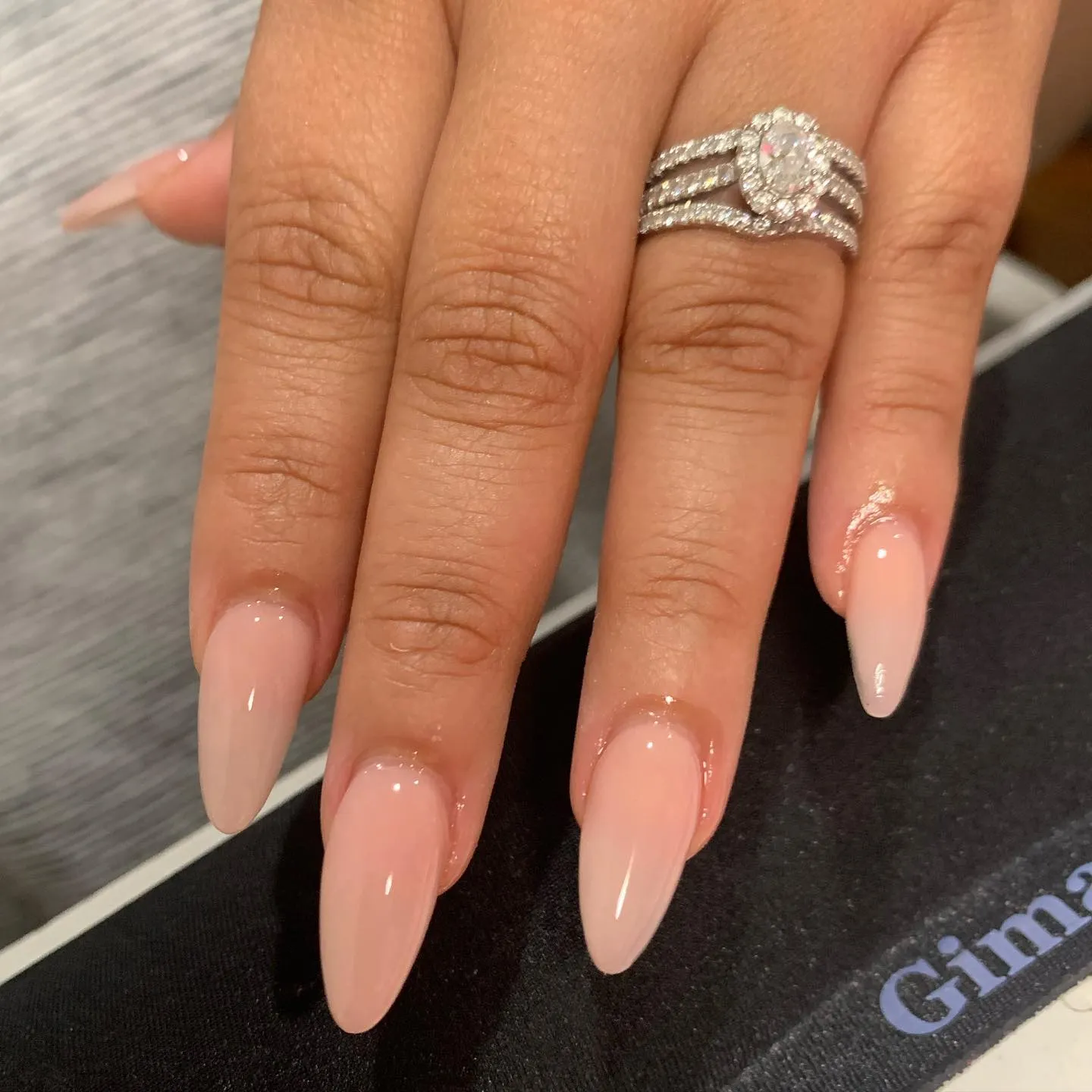 Nude Almond Nails with Bow Charm